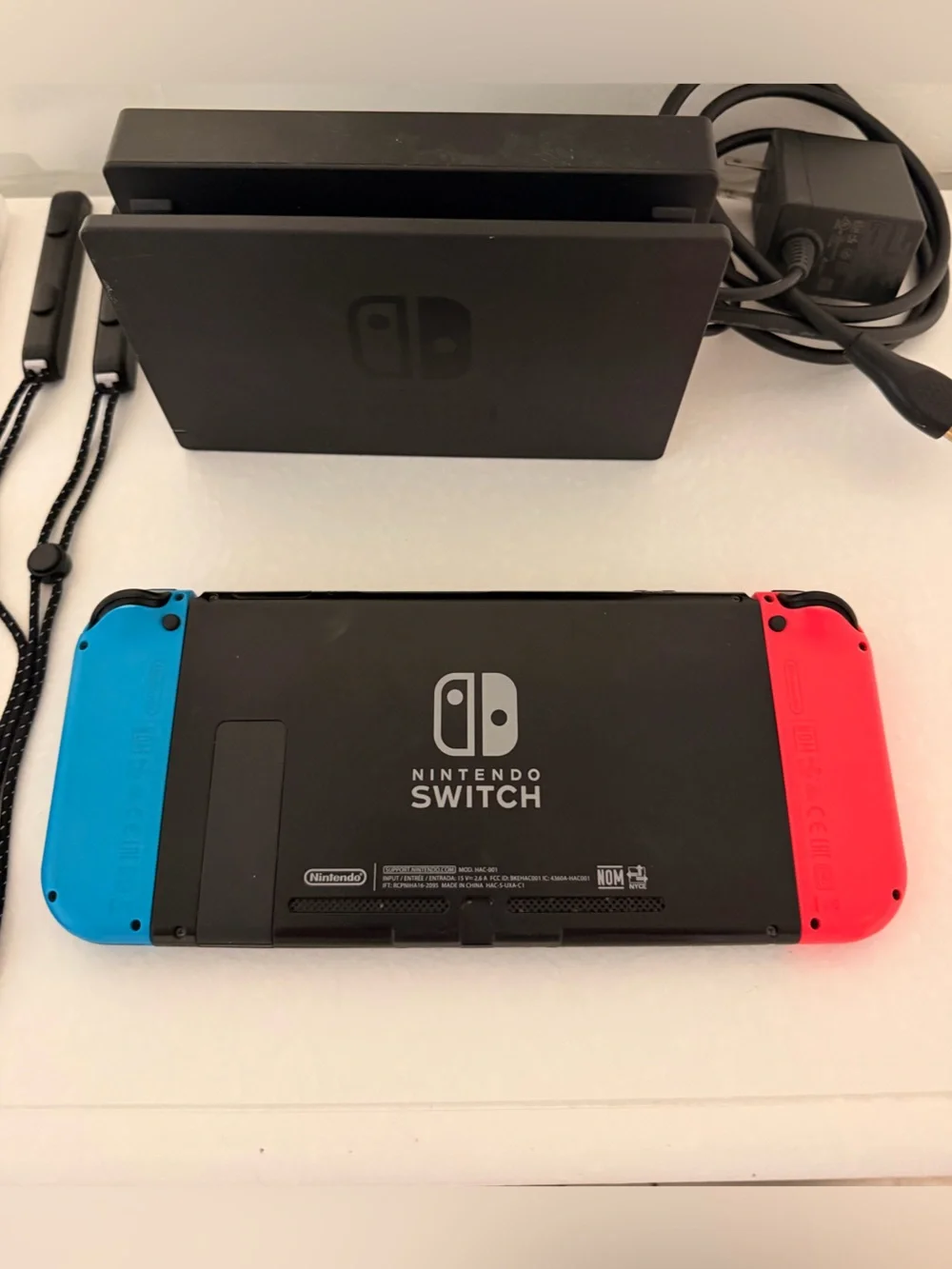 Nintendo Switch Console with Neon Red & Neon Blue Joy-Con + Animal Crossing Game